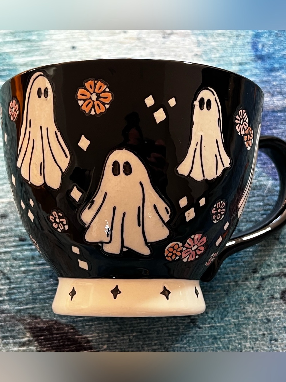 Potters Studio mug with ghost and flowers